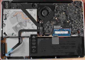 Mac laptop under repair and upcycling to extend its lifespan